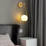 Clara" gouden glazen bol wandlamp